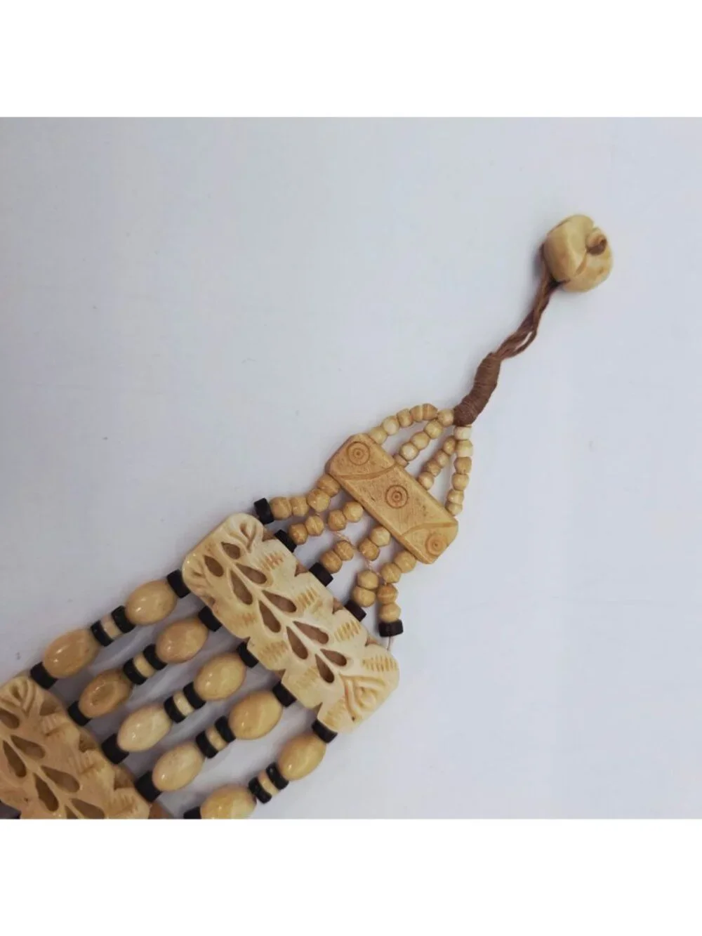 Hand-Carved Bone Beaded Belt With Intricate Leaf Pattern & Button Closure